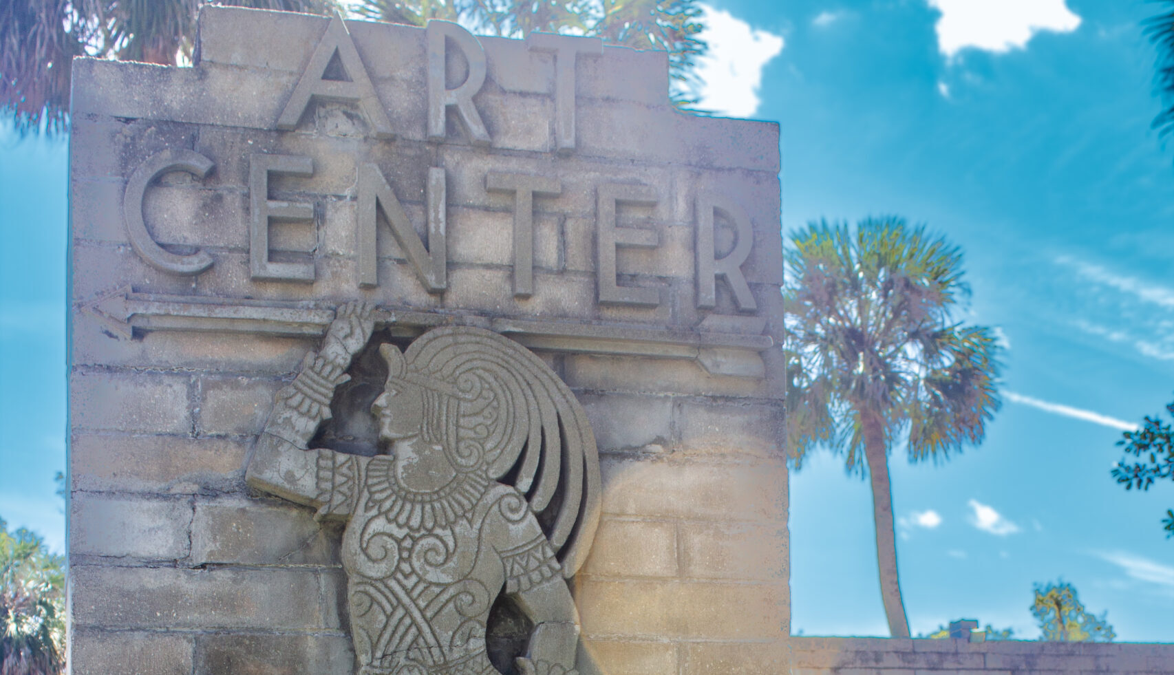 Art & History Center of Maitland. Brick column carved, featuring the figure of a man carved in an ancient Mayan style. The sigh reads ''Art Center, Research Studio''