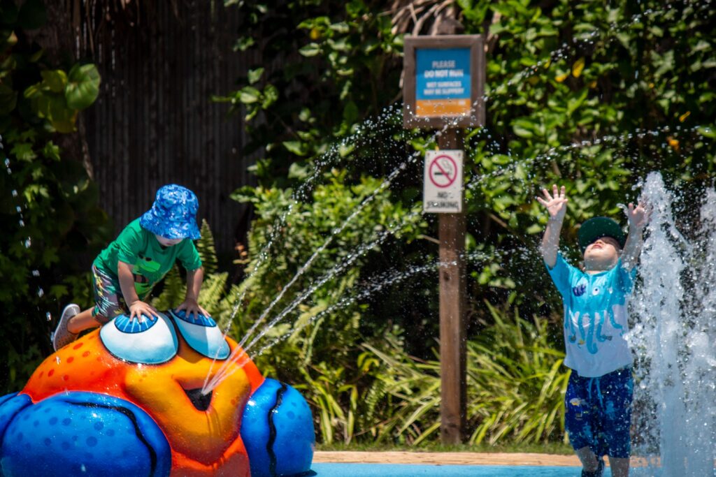 Children playing on a splash pad at the Central Florida Zoo