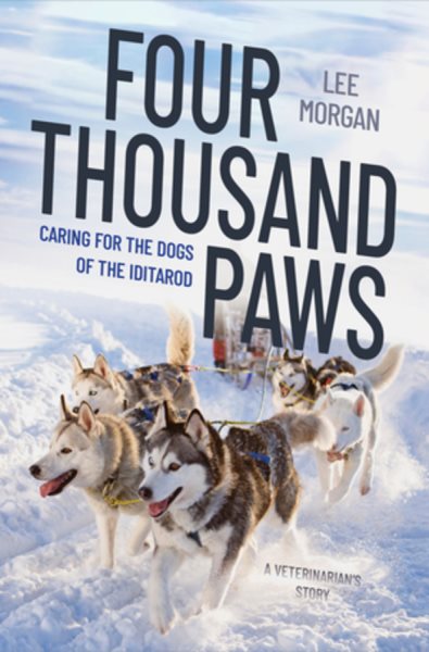 Cover art for Four thousand paws : caring for the dogs of the Iditarod : a veterinarian's story / Lee Morgan.