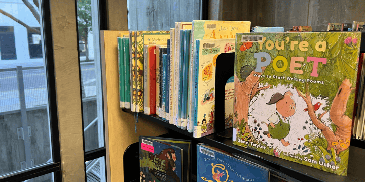 books about how to write poetry for kids on library shelf