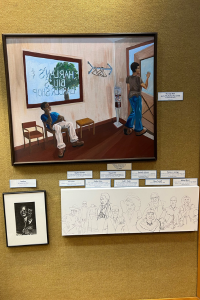 "The Long Wait" and "Satchmo" by Stephanie Black Grant and "African Americans in Fashion History" by J. Radcliff hang with context cards
