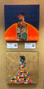 paintings "Veiled Essence" and "dress of Dreams" by Dafeney Josue hang with context cards