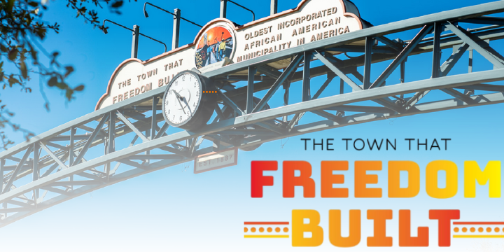 Eatonville historic entry arch with words "The Town that Freedom Built"