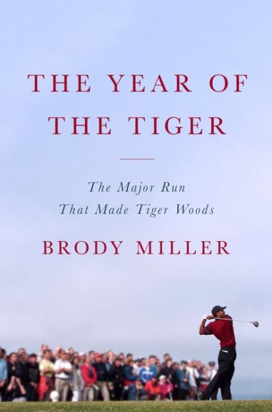 Cover art for The year of the Tiger : the major run that made Tiger Woods / Brody Miller.