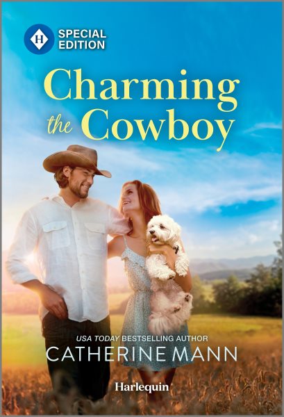 Cover art for Charming the cowboy / Catherine Mann.