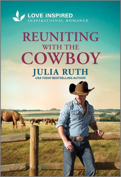 Cover art for Reuniting with the cowboy / Julia Ruth.