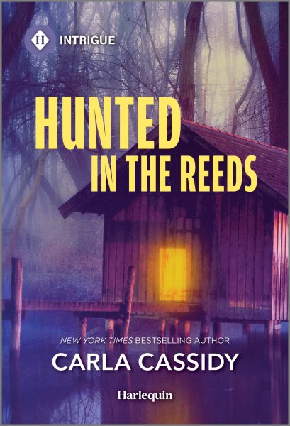 Cover art for Hunted in the reeds / Carla Cassidy.