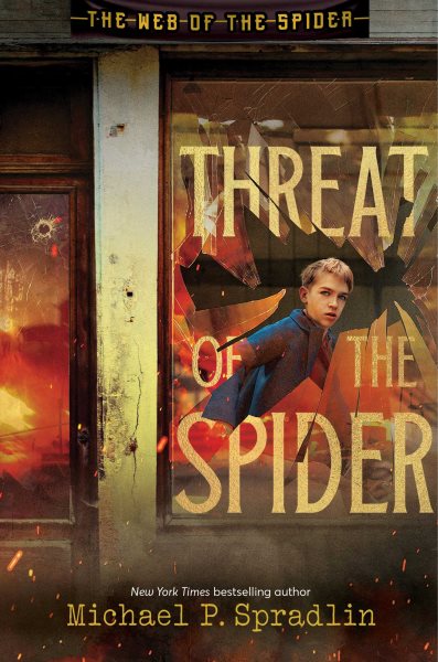 Cover art for Threat of the spider / Michael P. Spradlin.