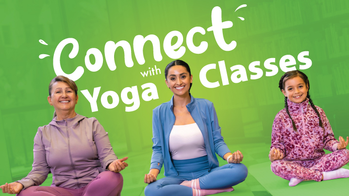 A multigenerational family does yoga together.