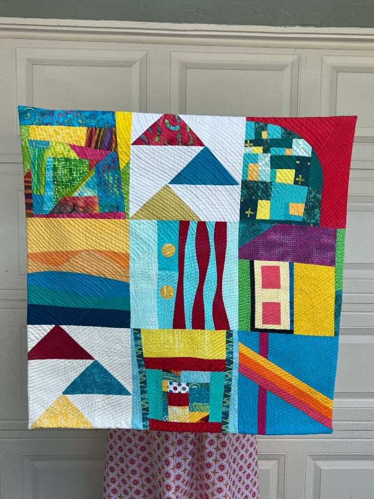 Colorful quilt made from 9 patterned squares
