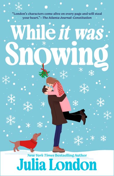 Cover art for While it was snowing / Julia London.