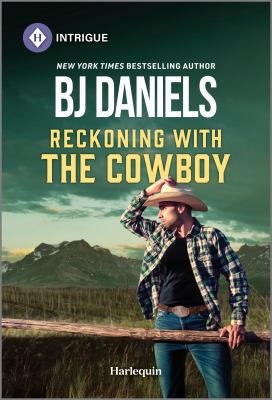 Cover art for Reckoning with the cowboy / B.J. Daniels.