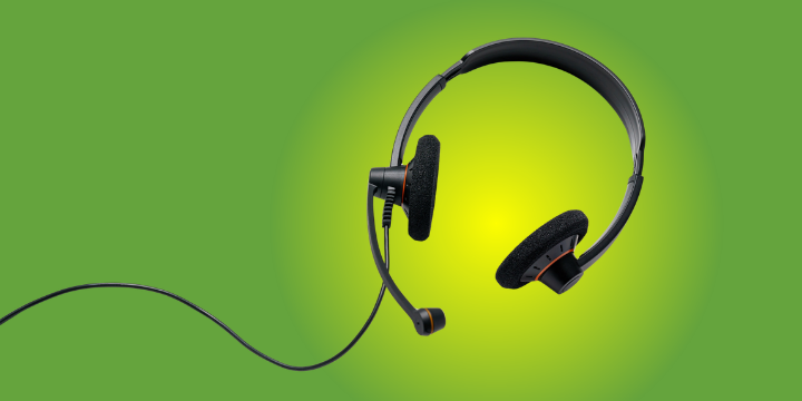 headset with microphone and cord on green background