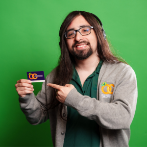 Questline staffer shows off OCLS library card