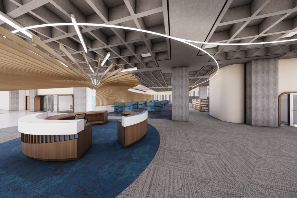 A contemporary library interior featuring multiple curved service desks beneath a dramatic, layered wooden ceiling structure, with columns, carpeted flooring, and open reading and seating areas extending into the background.